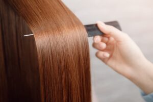 Smooth hair with visible flyaways in warm light